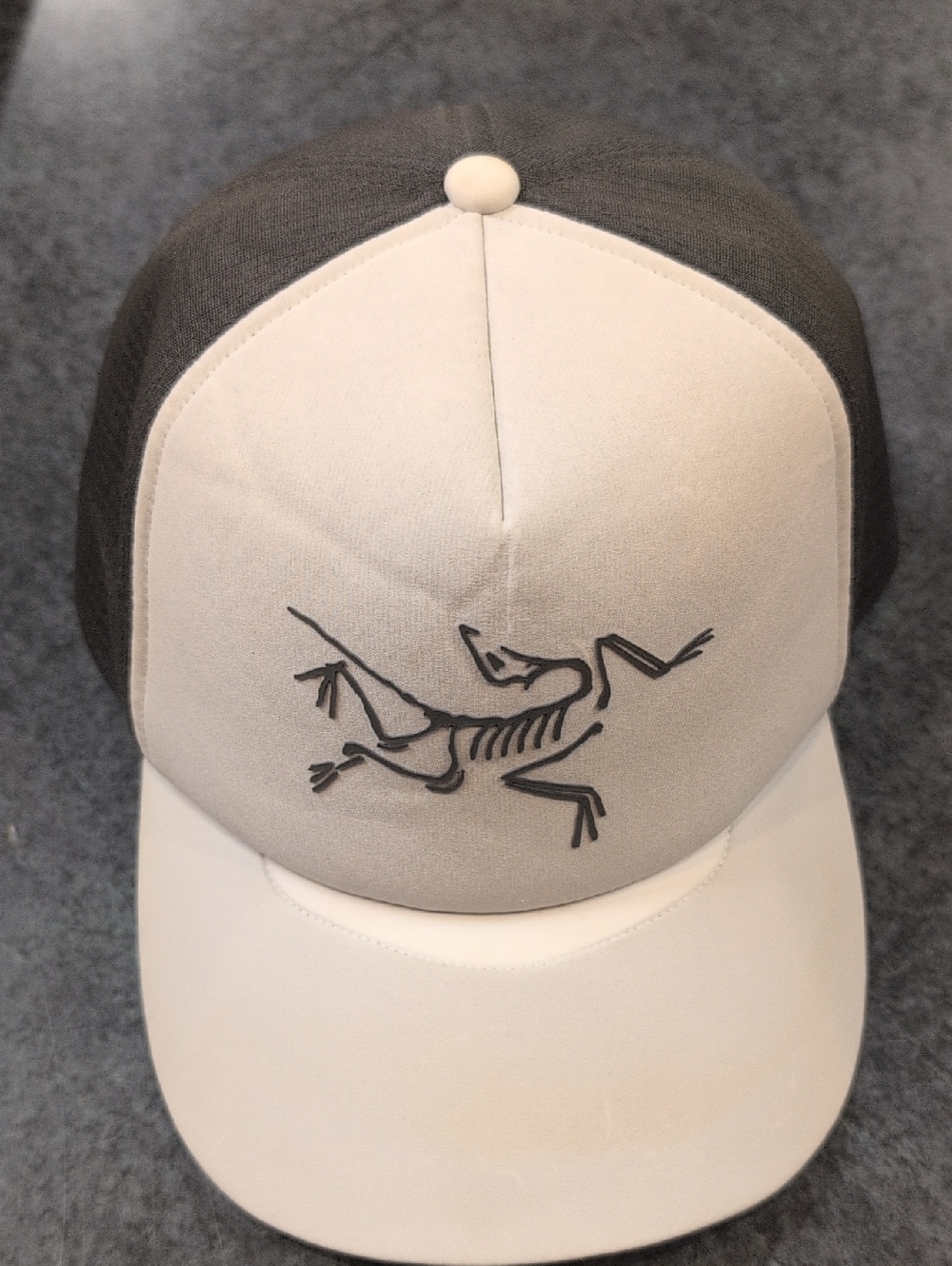 Arc'teryx White and Gray Trucker Cap with Skeleton Logo